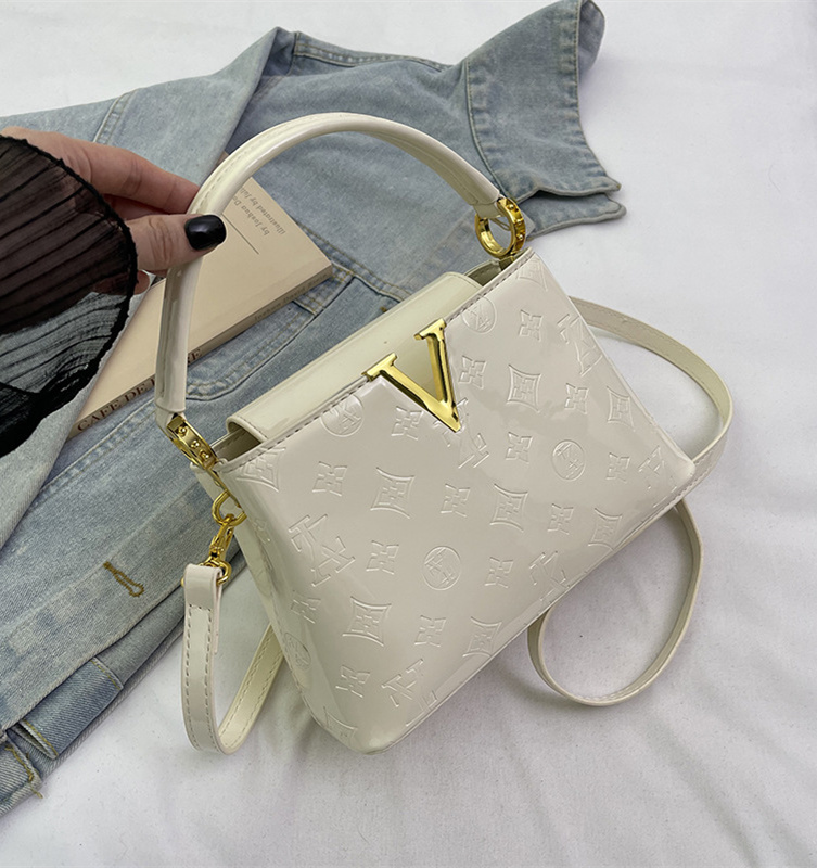 Free shipping designer women's 2025 new lacquered leather large capacity commuting bucket bag handbag light luxury single shoulder crossbody bag 