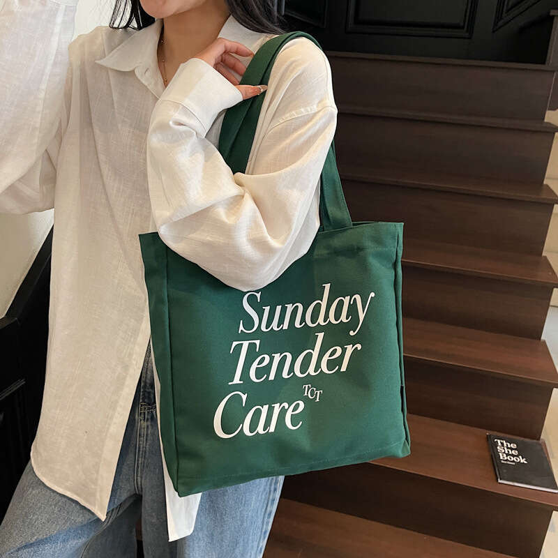 Korean Style Large Capacity Canvas Student 2025 New Casual Versatile Lightweight Letter Print Shoulder Bag