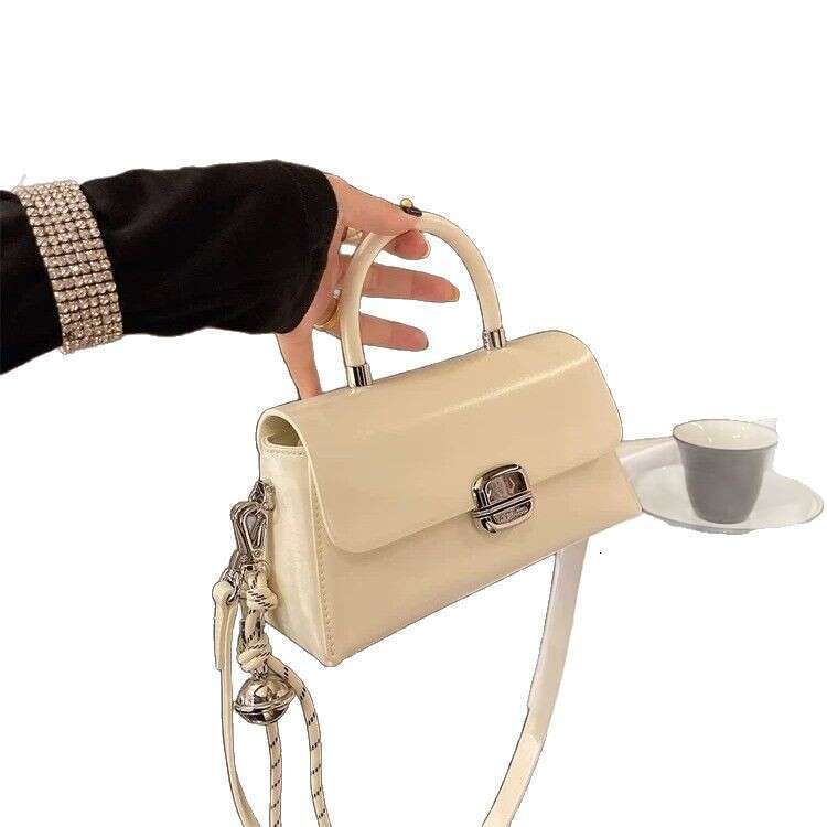 Niche Handheld High-end Genuine Leather Small Square 2025 Spring Summer New Korean Fashion Versatile Shoulder Crossbody Women's Bag
