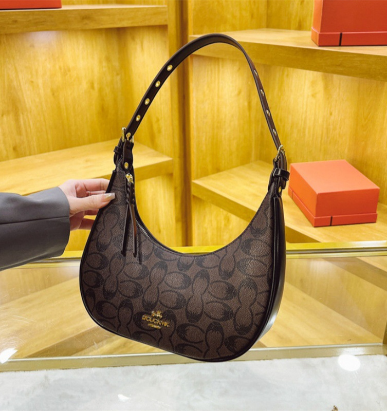 Free shipping designer high-end women's bag 2025 new trendy and fashionable crossbody bag armpit bag net Red Bull horn bag single shoulder bag tr