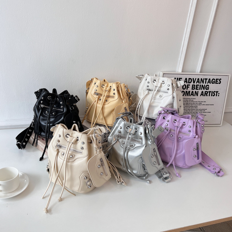 High quality brand new free designer bag cross-border European and American punk style bucket bag fashionable and trendy drawstring shoulder new free 