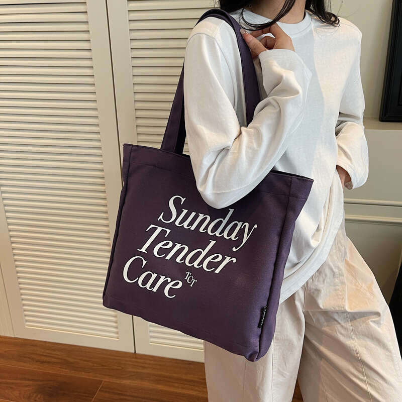 Korean Style Large Capacity Canvas Student 2025 New Casual Versatile Lightweight Letter Print Shoulder Bag