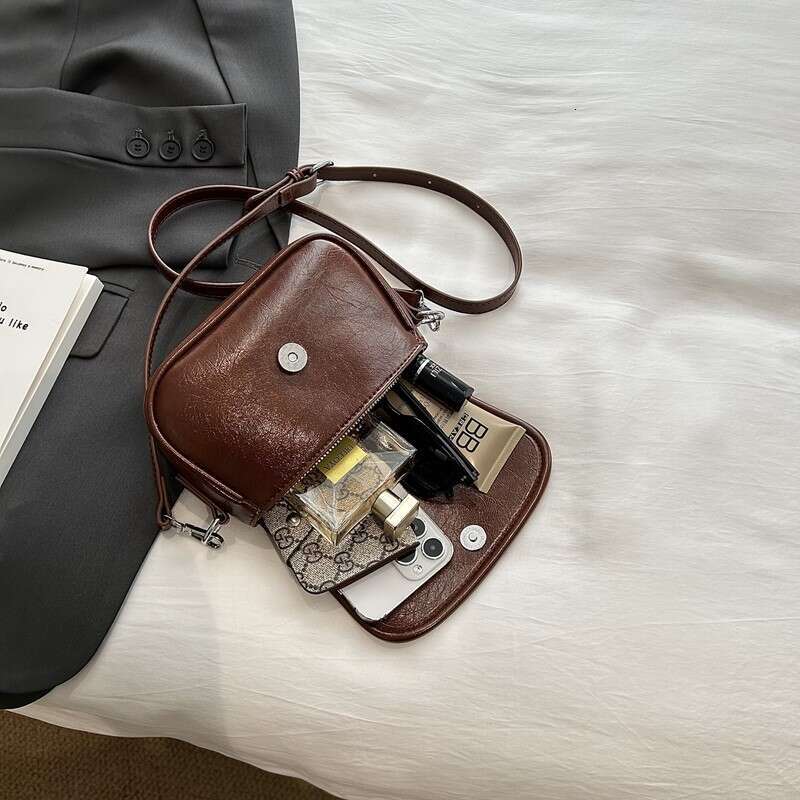 Handheld Small Square 2025 Korean Version Spring New Fashion Simple Stylish Shoulder Trendy Casual Crossbody Bag