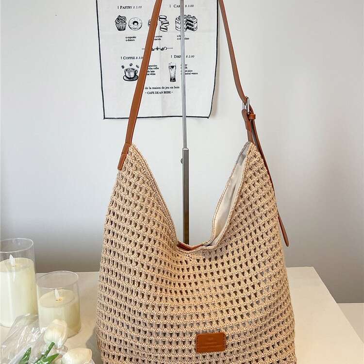 2025 Summer New Hollow Knit Large Capacity Beach Vacation Straw Casual Commuter Tote Bag