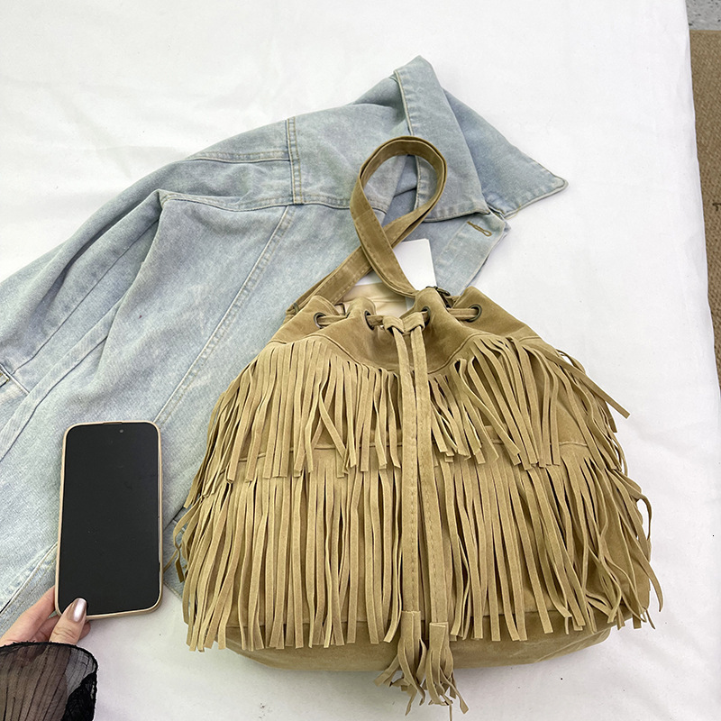 Free Shipping 2025 New Designer Bag Casual High-quality Shopping Bag Simple Retro Tassel Drawstring Bucket Handbag