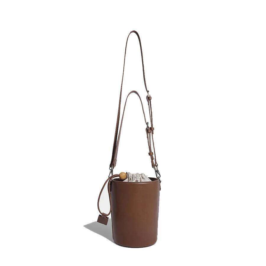 Korean drawstring cylinder design bucket bag female solid purse handbags fashion trend pu leather single shoulder crossbody bags