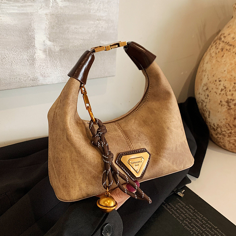 Designer High-end niche bags, women's autumn and winter retro 2025 fashion single-shoulder crossbody bags, women's hand-held dumpling bags, 