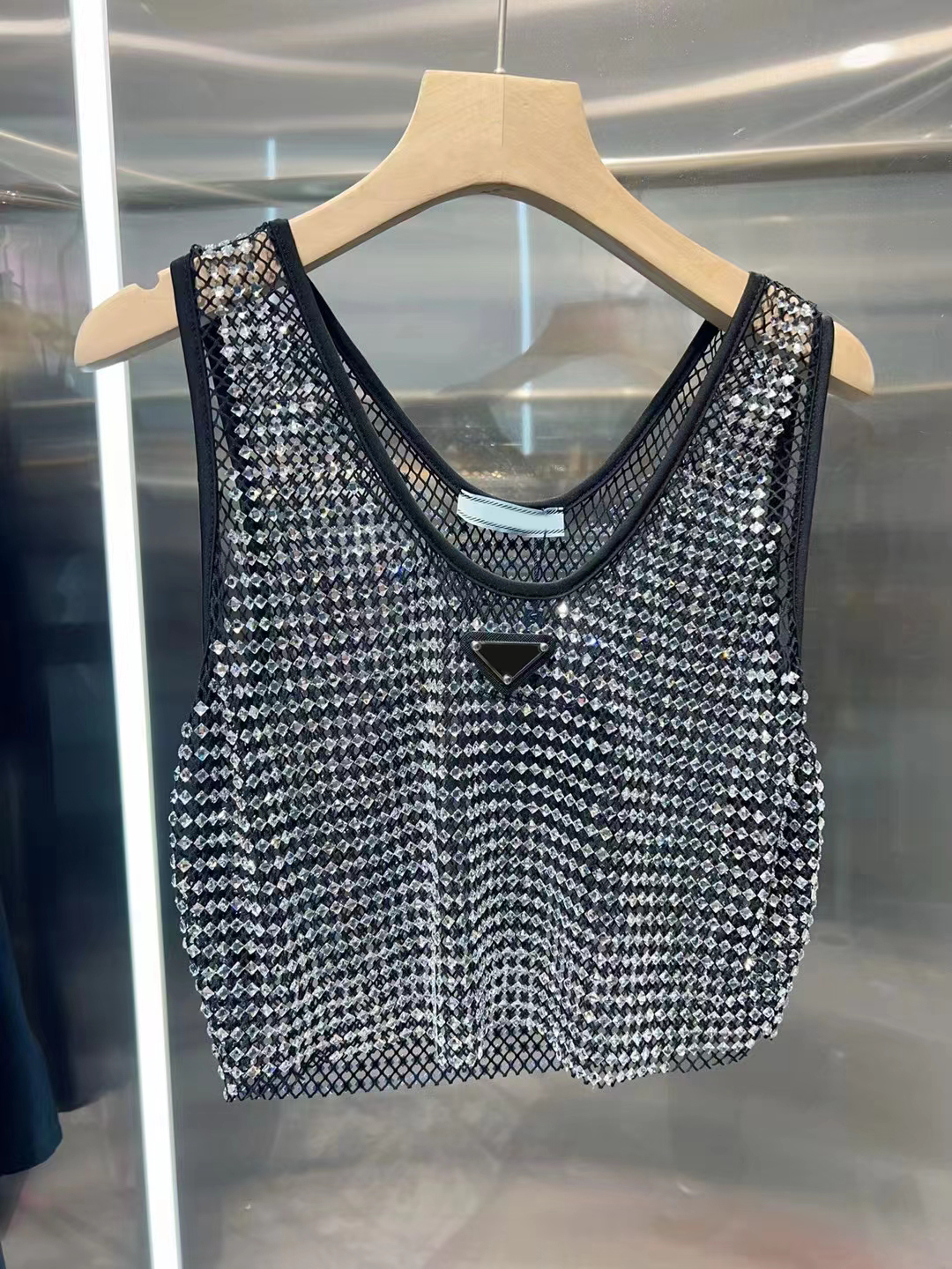 Women's Spring and summer round neck sleeveless hot stamping heavy industry shiny hollow elastic mesh European and American vest Tops