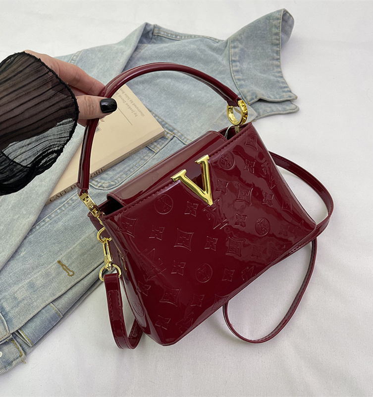 Free shipping designer women's 2025 new lacquered leather large capacity commuting bucket bag handbag light luxury single shoulder crossbody bag 