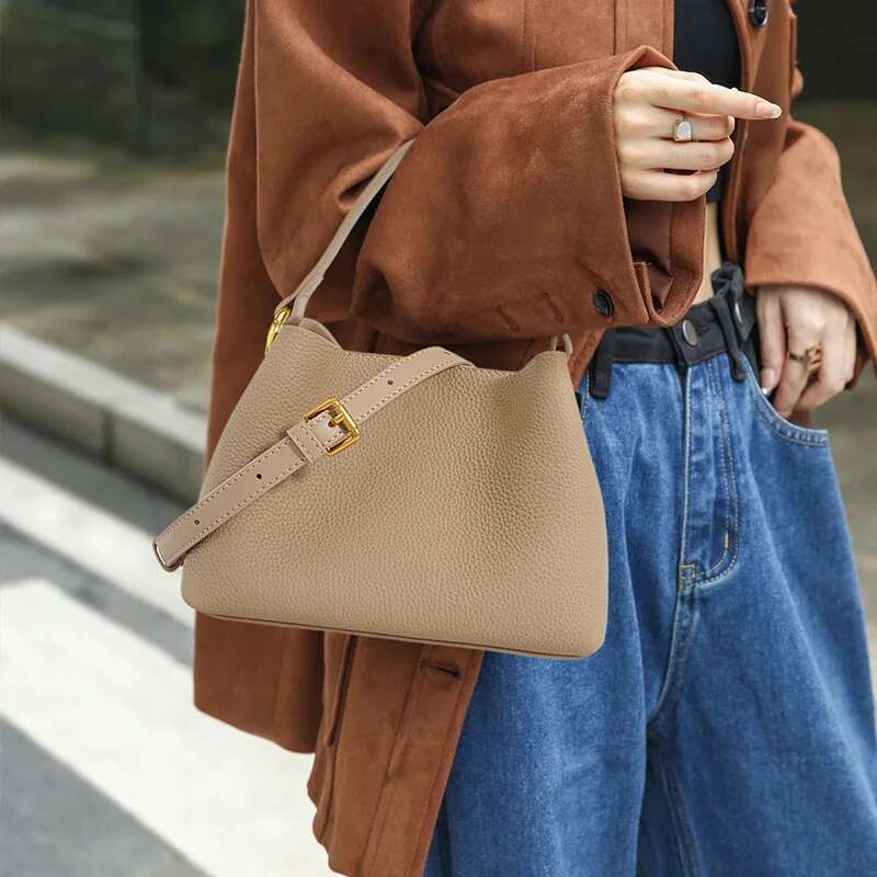 2024 Soft Cowhide Bucket Handbag Female Niche Fashion Commuter Shoulder Crossbody Bag