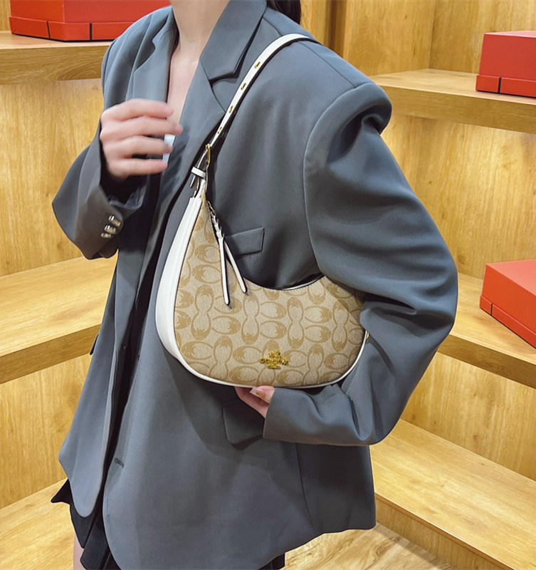 Free shipping designer high-end women's bag 2025 new trendy and fashionable crossbody bag armpit bag net Red Bull horn bag single shoulder bag tr