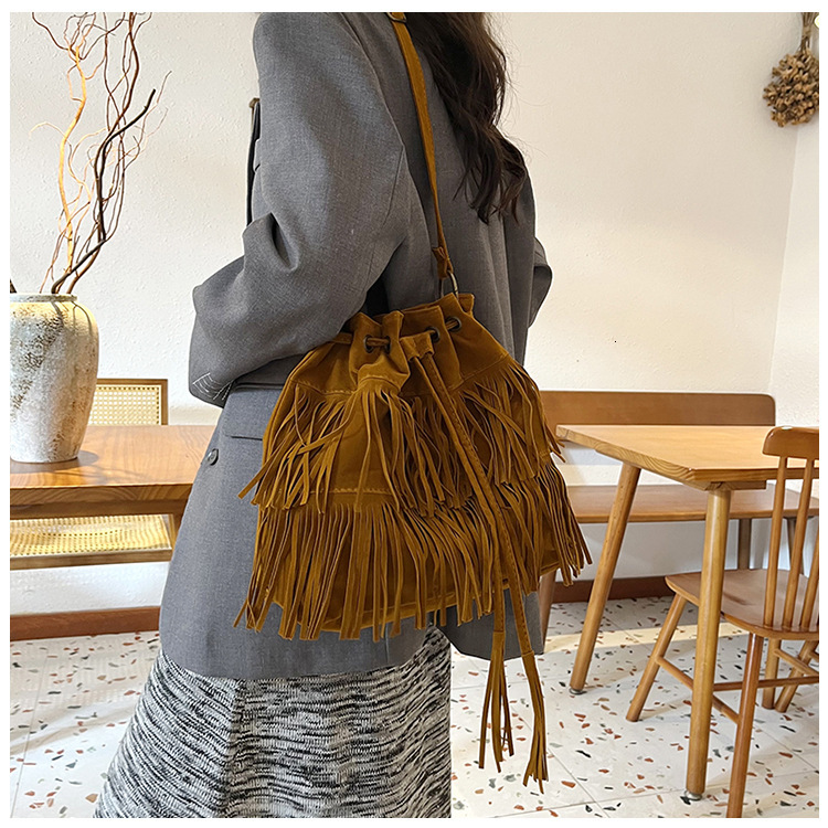 Free Shipping 2025 New Designer Bag Casual High-quality Shopping Bag Simple Retro Tassel Drawstring Bucket Handbag