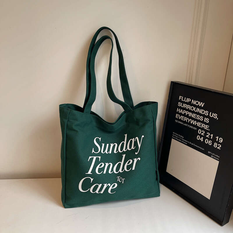 Korean Style Large Capacity Canvas Student 2025 New Casual Versatile Lightweight Letter Print Shoulder Bag