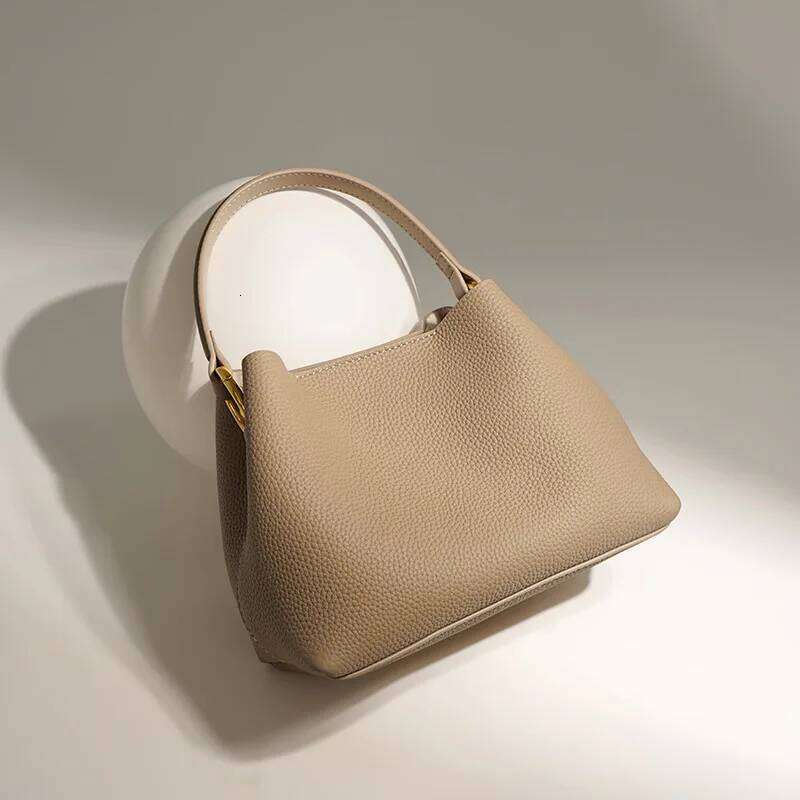 2024 Soft Cowhide Bucket Handbag Female Niche Fashion Commuter Shoulder Crossbody Bag