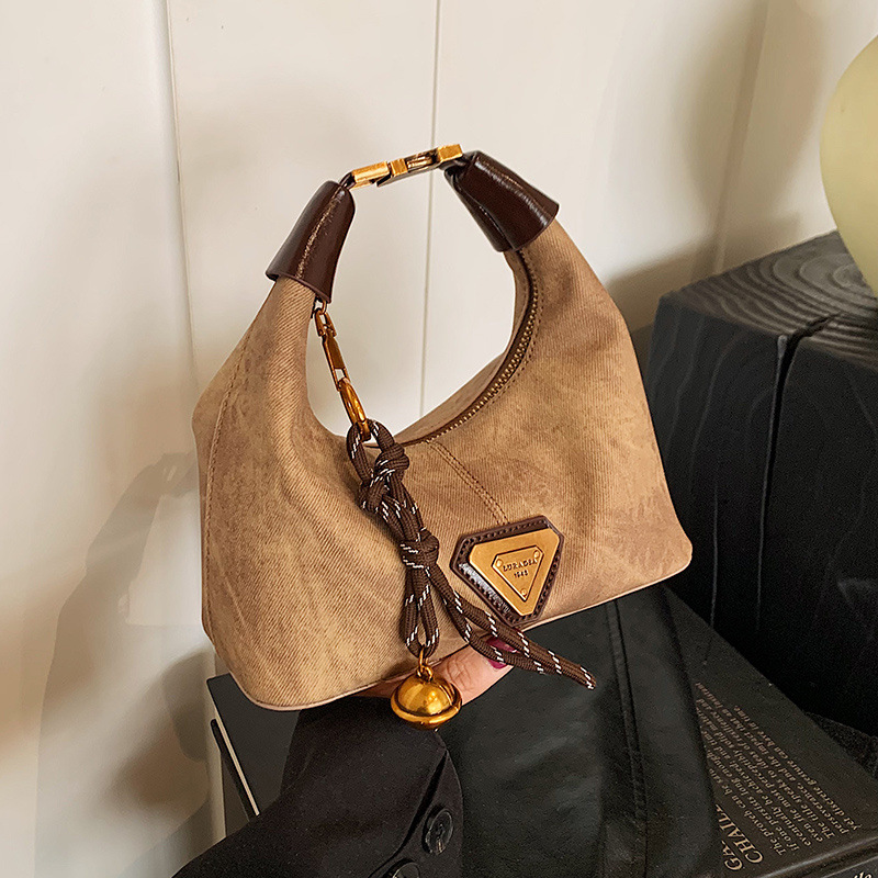 Designer High-end niche bags, women's autumn and winter retro 2025 fashion single-shoulder crossbody bags, women's hand-held dumpling bags, 