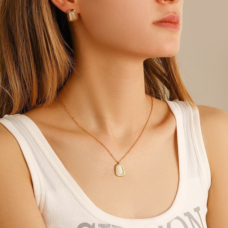 French Style Light Simple Fashionable Elegant Gold Cat's Eye Stone Necklace Earrings for Women Titanium Steel High-end Versatile Jewelry