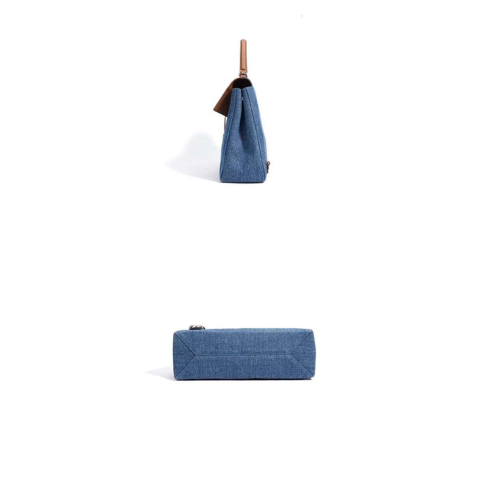 Modern classic design backpack for girls, popular and retro style. Made of denim fabric. Fashionable school bag. Handbag. Backpa