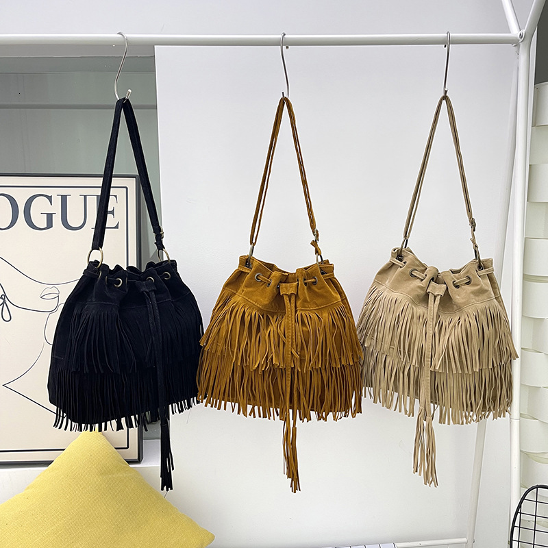 Free Shipping 2025 New Designer Bag Casual High-quality Shopping Bag Simple Retro Tassel Drawstring Bucket Handbag
