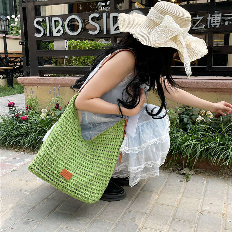 2025 Summer New Hollow Knit Large Capacity Beach Vacation Straw Casual Commuter Tote Bag