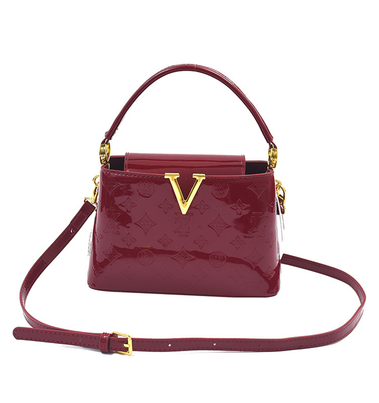 Free shipping designer women's 2025 new lacquered leather large capacity commuting bucket bag handbag light luxury single shoulder crossbody bag 