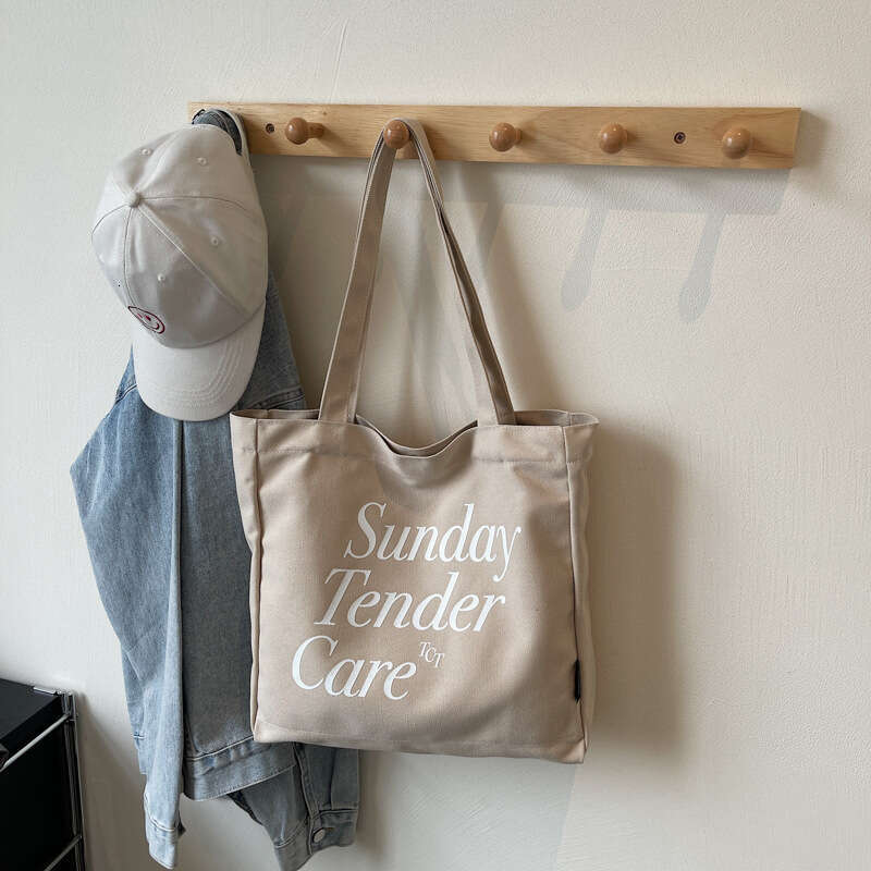 Korean Style Large Capacity Canvas Student 2025 New Casual Versatile Lightweight Letter Print Shoulder Bag