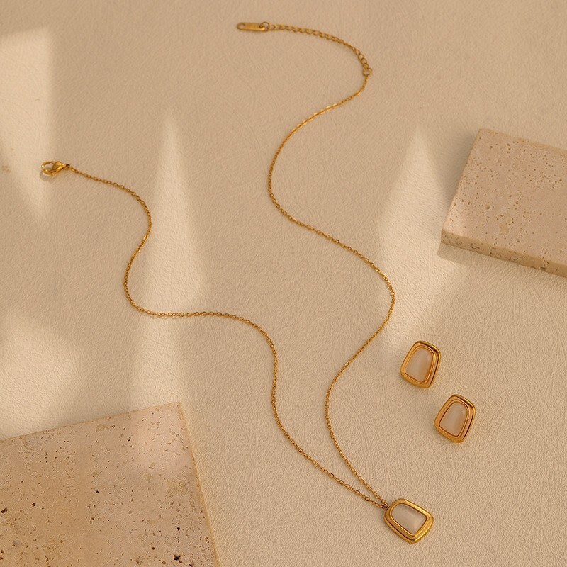 French Style Light Simple Fashionable Elegant Gold Cat's Eye Stone Necklace Earrings for Women Titanium Steel High-end Versatile Jewelry