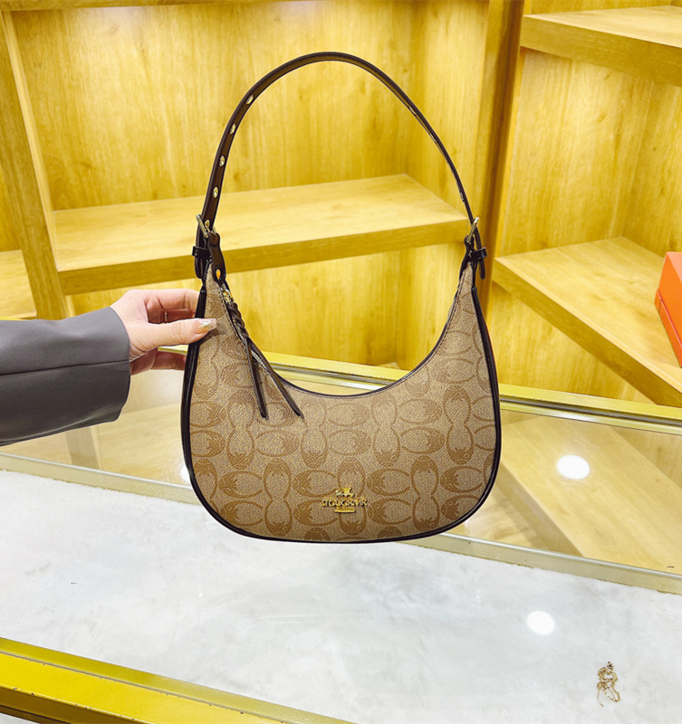 Free shipping designer high-end women's bag 2025 new trendy and fashionable crossbody bag armpit bag net Red Bull horn bag single shoulder bag tr