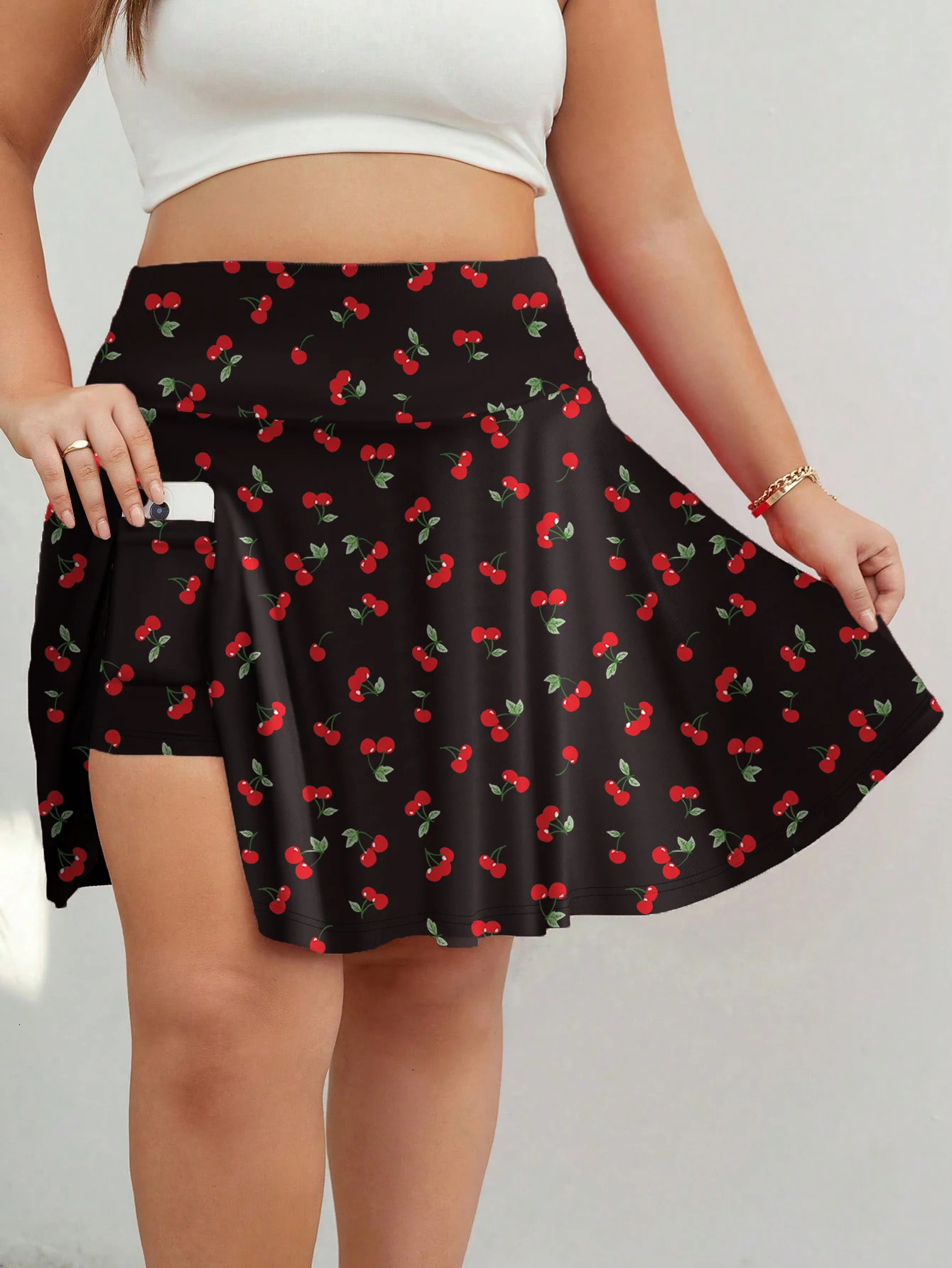 The plussize womens clothing is casual and comfortable featuring two short skirts 250610A