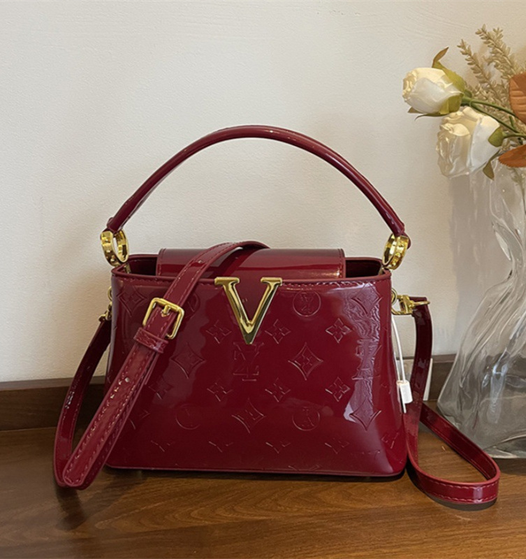 Free shipping designer women's 2025 new lacquered leather large capacity commuting bucket bag handbag light luxury single shoulder crossbody bag 