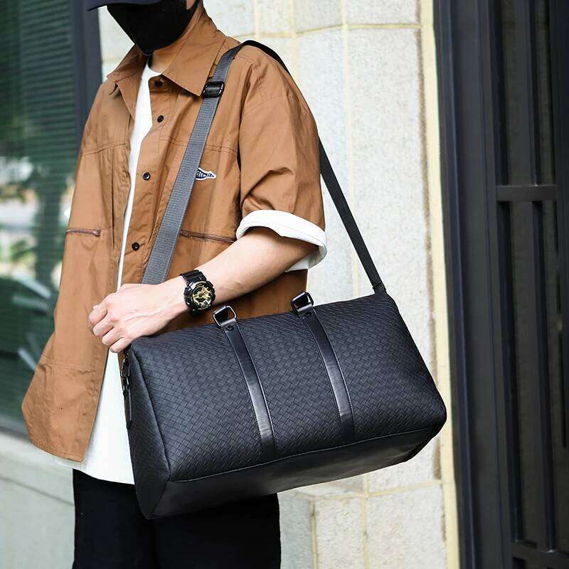 Large capacity black woven leather men's and women's travel handbag shoulder crossbody bag large size lage sac de voyage