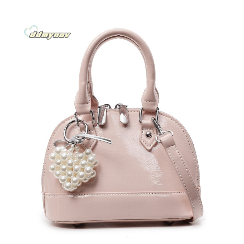 Niche Solid Color Versatile Handheld Shell for Women 2025 Spring Summer New Small Exquisite Fashion Single Shoulder Crossbody Bag ddmynov ddmynov