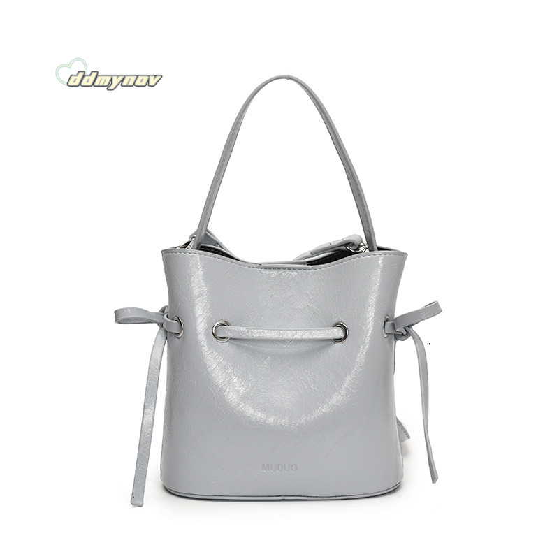 Korean Style Simple Cream Wind Handheld Bucket for Women 2025 Summer New Fashion Trend Versatile Shoulder Crossbody Bag ddmynov ddmynov ddmynov