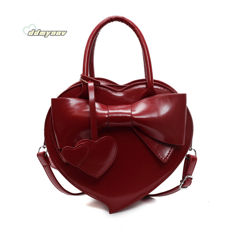 2025 New Early Spring Cute Niche Bowknot Handbag Heart Women Fashion Stylish Versatile Crossbody Bag ddmynov