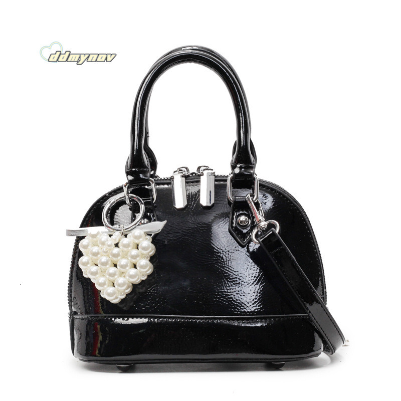 Niche Solid Color Versatile Handheld Shell for Women 2025 Spring Summer New Small Exquisite Fashion Single Shoulder Crossbody Bag ddmynov ddmynov
