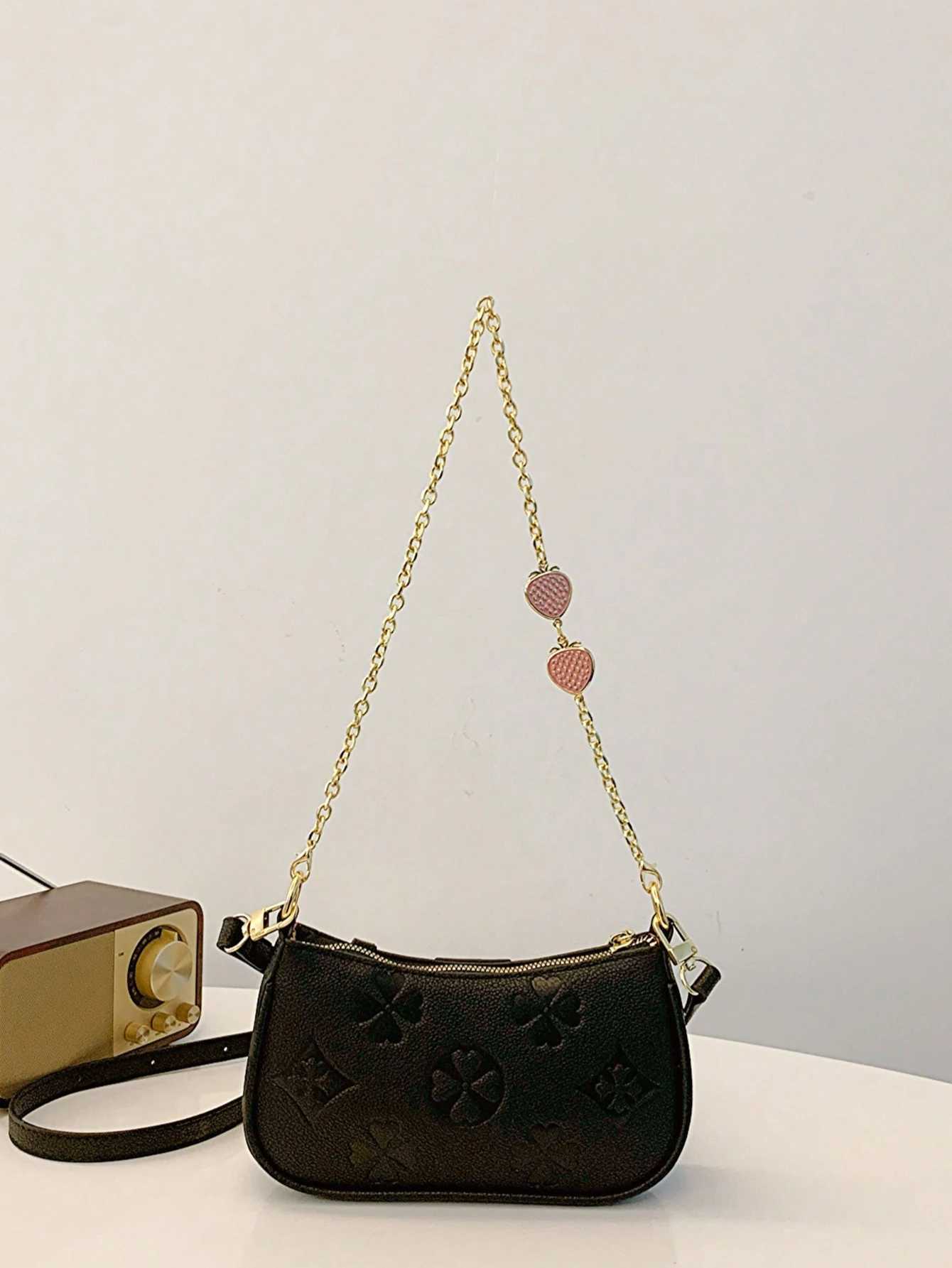 In 2024 the new fashion classic Joker body print pattern design metal chain decoration design underarm baguette bag is suitable. XJ2520616