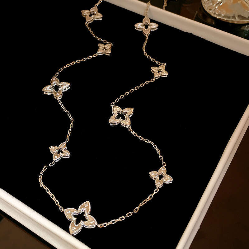 2025 new Luxury Jewelry Designer bracelet necklace earrings Real Gold Plated Zircon Rhombus Flower Necklace High end Fashion Sweater Chain Autumn Wint