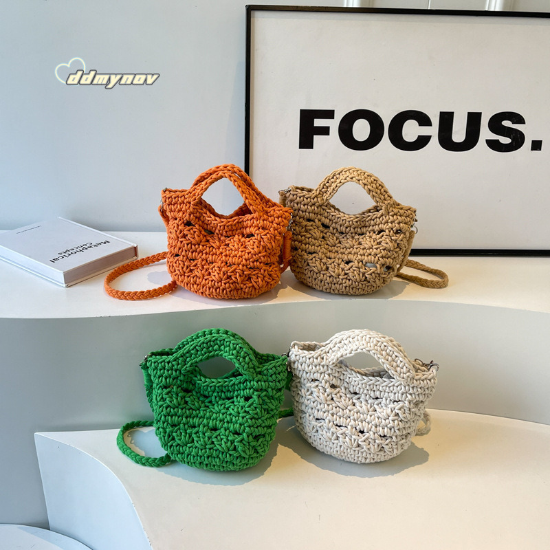 2025 New Large Capacity Women's Artistic Handwoven Hollow Bucket Beach Simple Crossbody Bag ddmynov