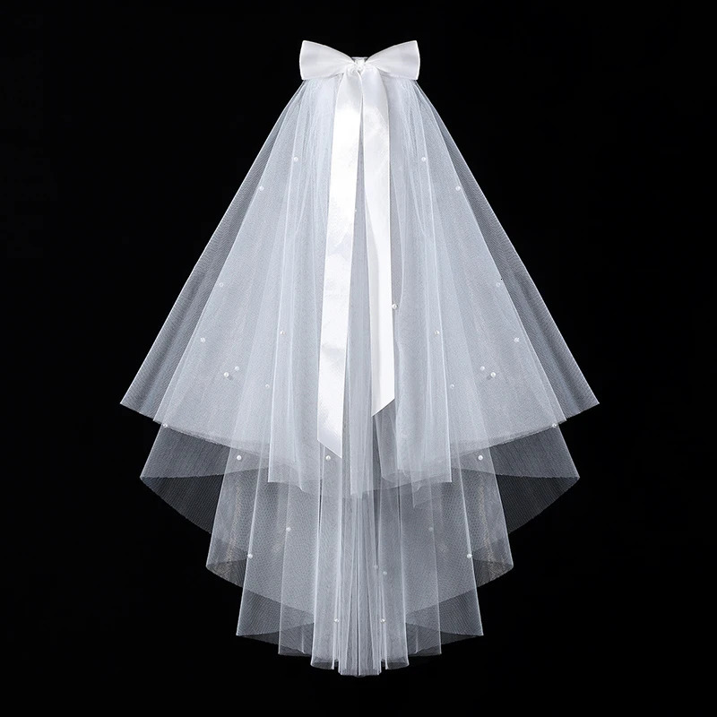 Elegant white minimalist bridal veil suitable for womens weddings with a waist length veil excluding model earrings 250610