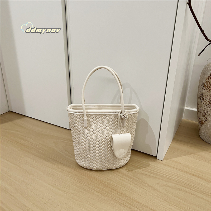 This Season 2025 New Fashion Woven Handbag Small Bucket Textured Shoulder Crossbody Women's Bag ddmynov
