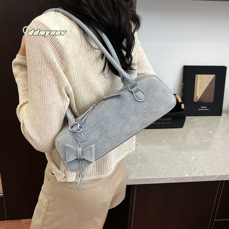 French Style Light Luxury Niche Underarm for Women 2025 Summer Fashion Bowknot Versatile Textured Shoulder Baguette Bag ddmynov ddmynov