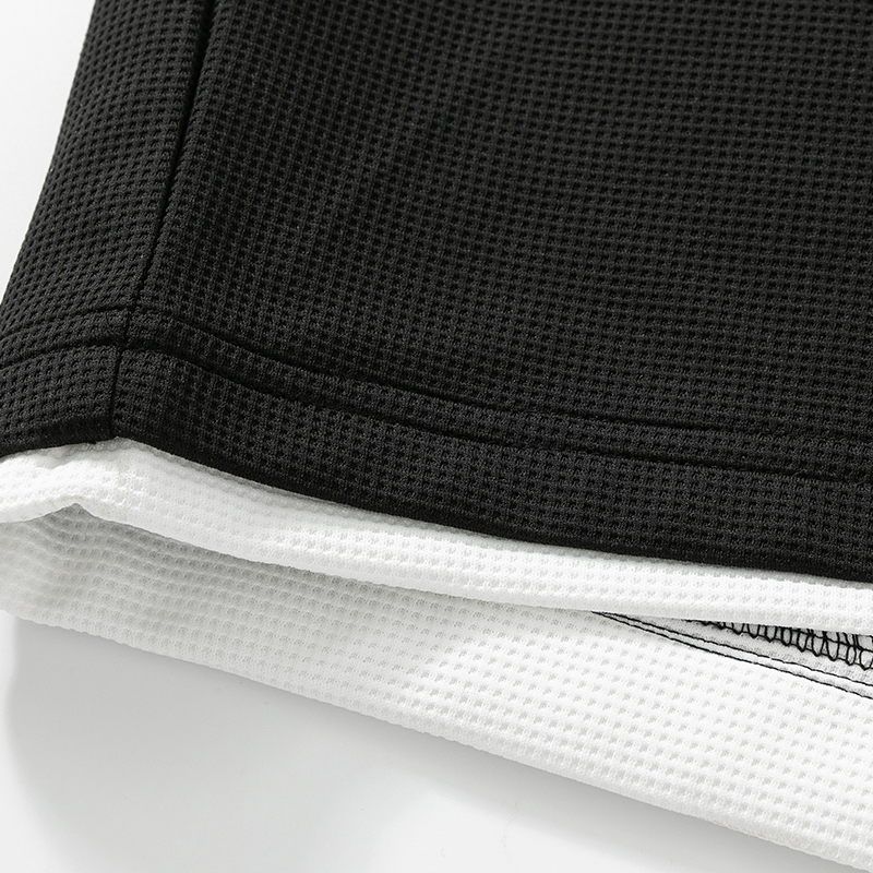 Chic Looser-Fit Apparel Collection: Contemporary Unisex Sports Garments