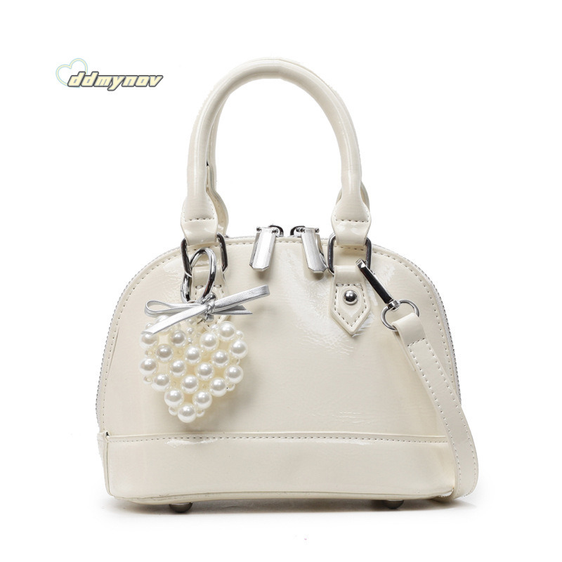Niche Solid Color Versatile Handheld Shell for Women 2025 Spring Summer New Small Exquisite Fashion Single Shoulder Crossbody Bag ddmynov ddmynov