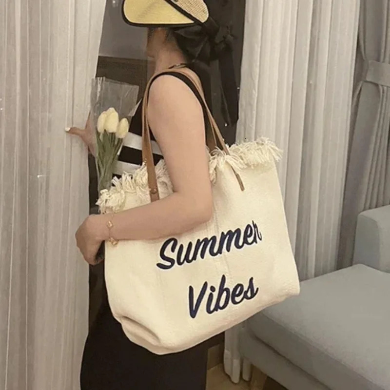 2025 New Fashion Woven Canvas Beach Tassel Embroidery Letters Womens Large Capacity Tote Hand Magnetic Snap Single-shoulder Bag R250616