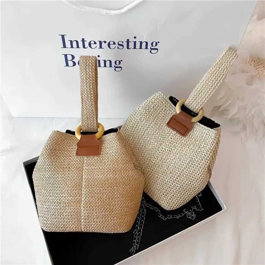NEW 1 Pcs Womens Handheld One Shoulder Diagonal Straddle Bag Summer New Fashion Versatile PP Woven Chain Bucket Bag XJ2520616