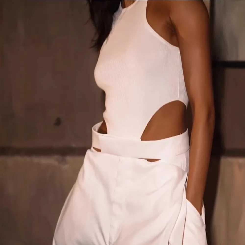 Fashion Jumpsuits For Women Summer O Neck Sveless Hollow Out Slim White Wide Leg Jumpsuit Girl High Street Chic Sexy JumpsuitXJ250616
