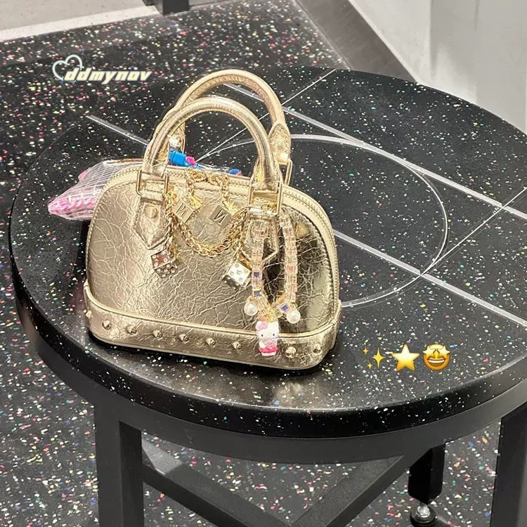Niche High-End Champagne Gold Rivet Handbag Shell Small 2025 New Fashionable Shoulder Crossbody Bag ddmynov