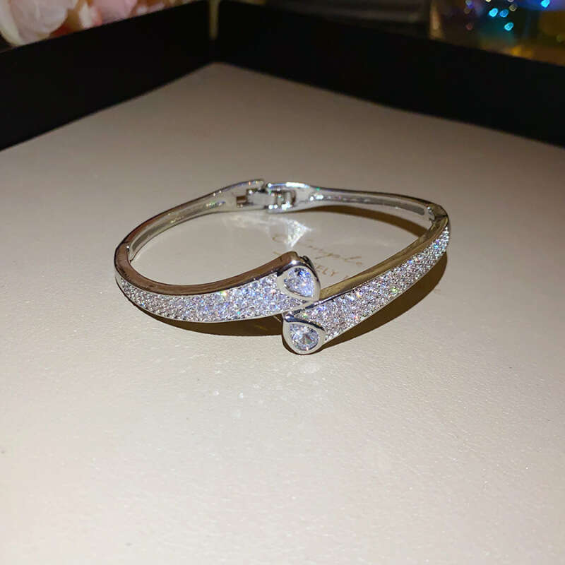 2025 hot designer bracelet 14K Real Gold Plated Zircon Wave Twisted Light High-end Sense Bracelet Niche Design Jewelry for Women