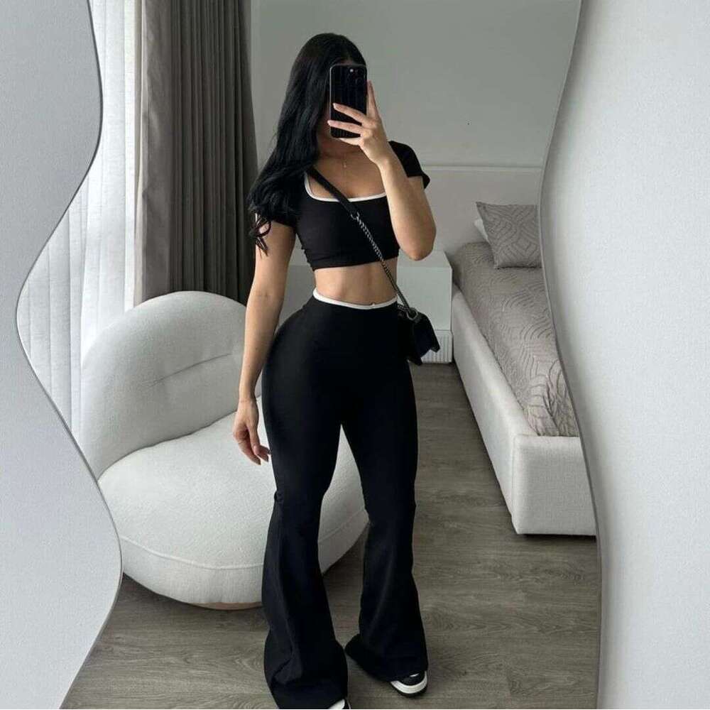 New Fashion Solid Color Casual Sports Style Slim Fit Top Short Sleeve Flared Long Pants Set For Women B5