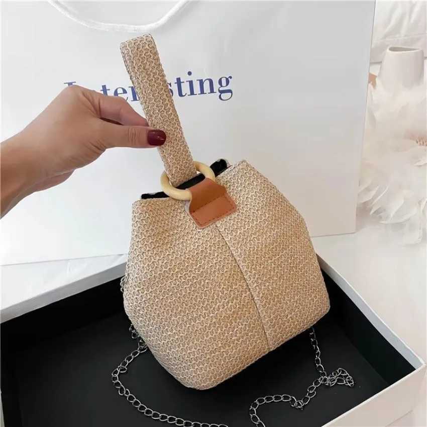 NEW 1 Pcs Womens Handheld One Shoulder Diagonal Straddle Bag Summer New Fashion Versatile PP Woven Chain Bucket Bag XJ2520616