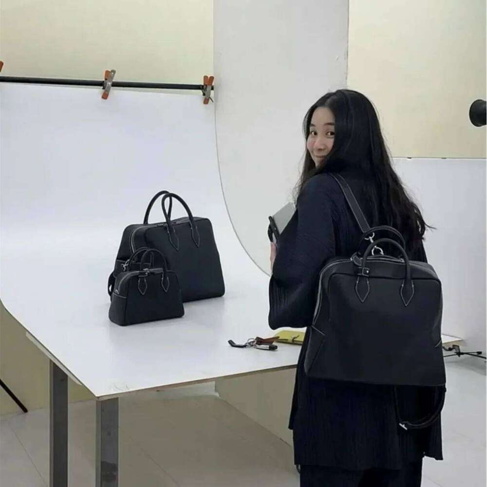 Nichekimsapparel Large Capacity Motorcycle Cow Leather Double Shoulder Commute Backpack Computer Bag From China